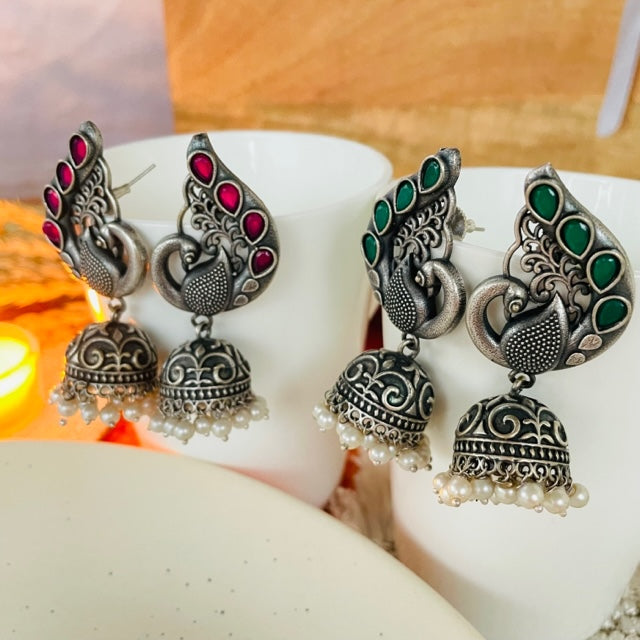 Oxidised Silver Jhumka With Round Peacock Stud